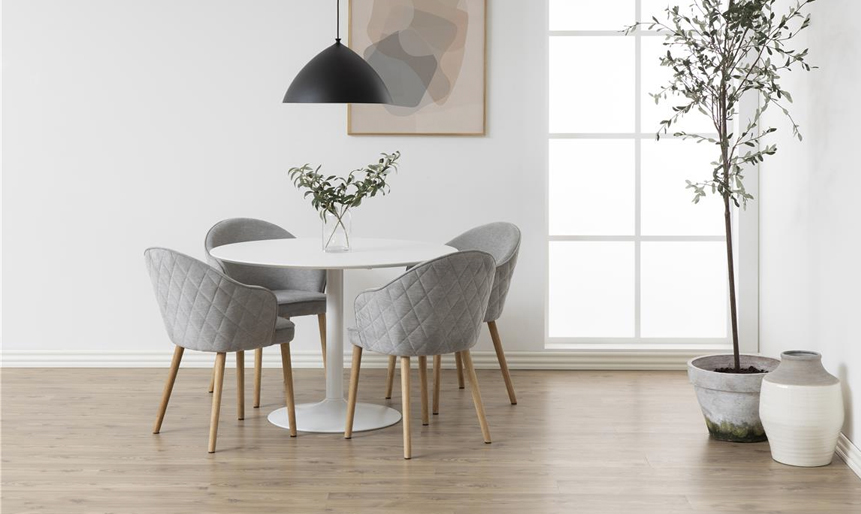 Fuldend din boligs stil med et hvidt spisebord